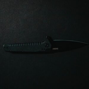 EDC folding knife open on wood — demo image